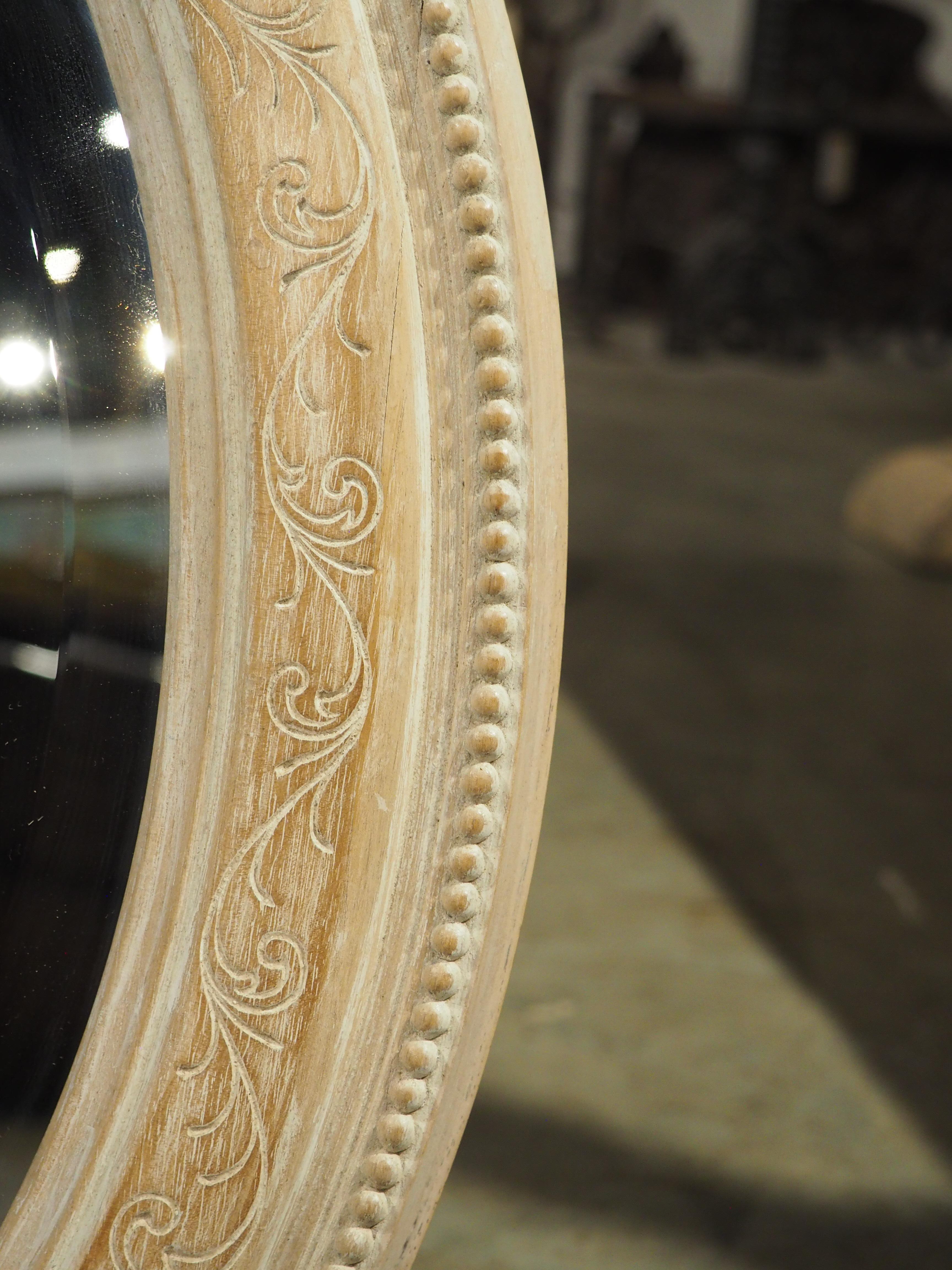 Pair of French Louis XVI Carved and Whitewashed Wooden Oval Mirrors, Early 1900s 8