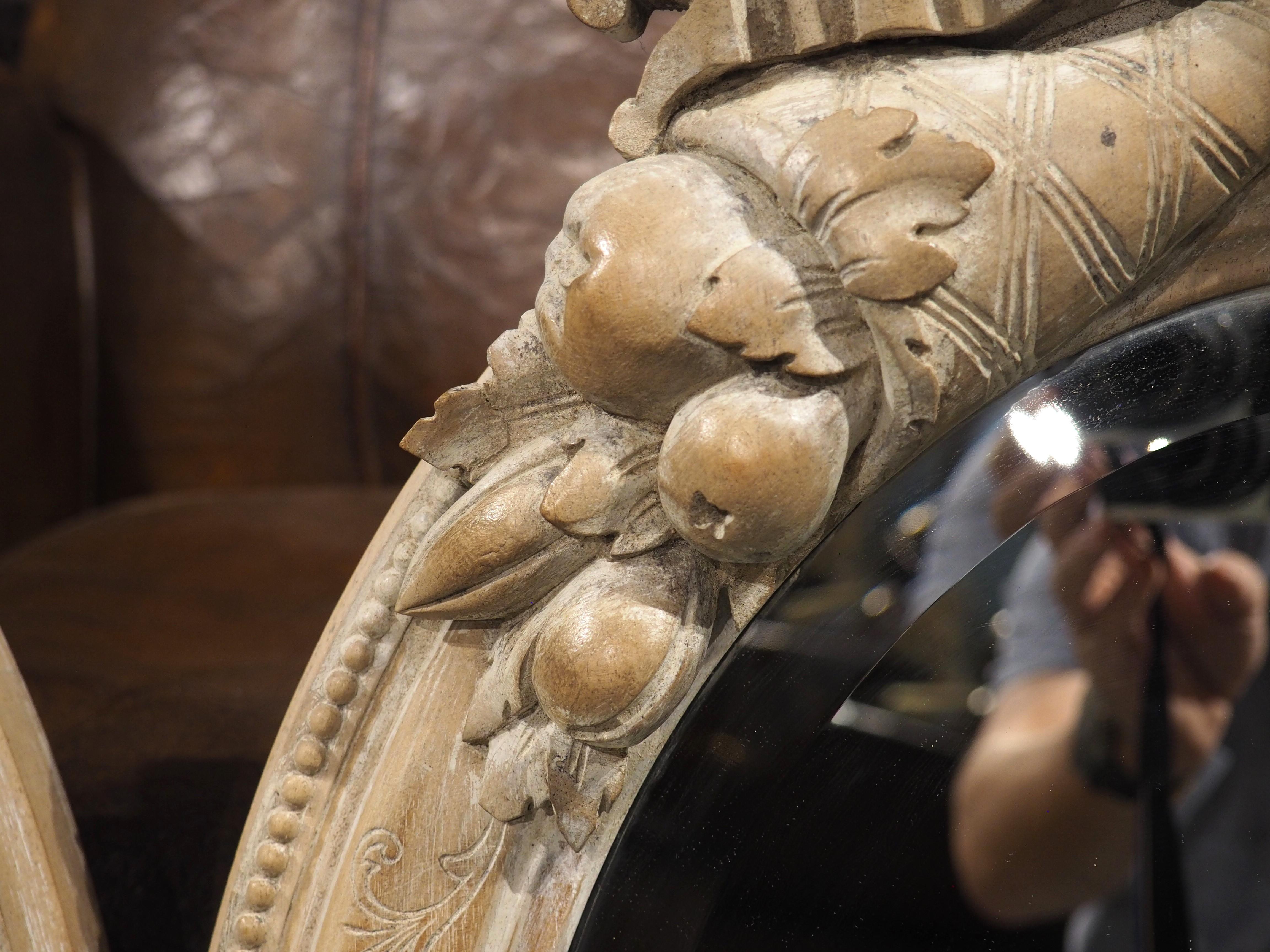 Pair of French Louis XVI Carved and Whitewashed Wooden Oval Mirrors, Early 1900s 2