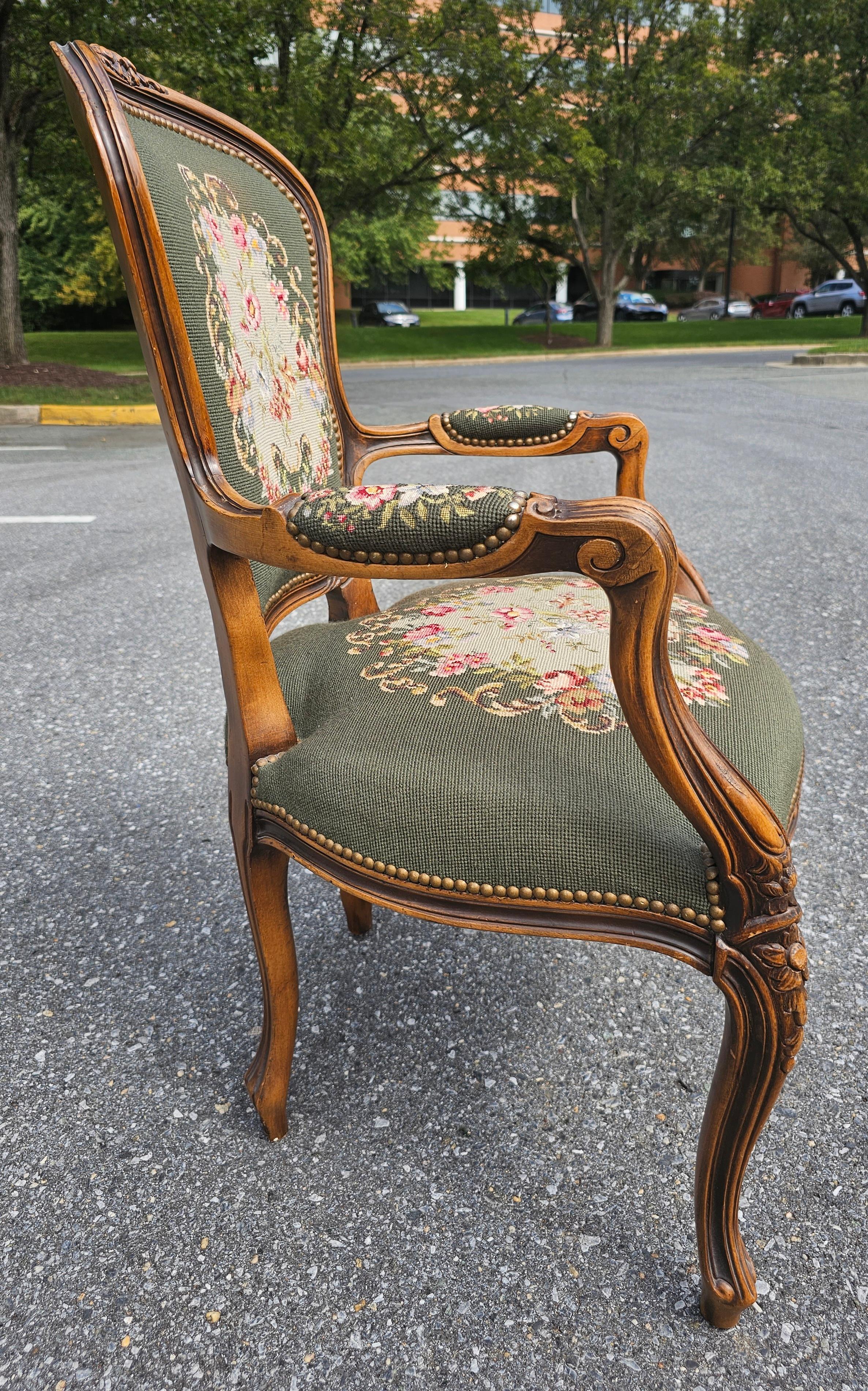 20th Century Pair of French Louis XVI Carved Fruitwood and Needlepoint Upholstered Bergeres For Sale