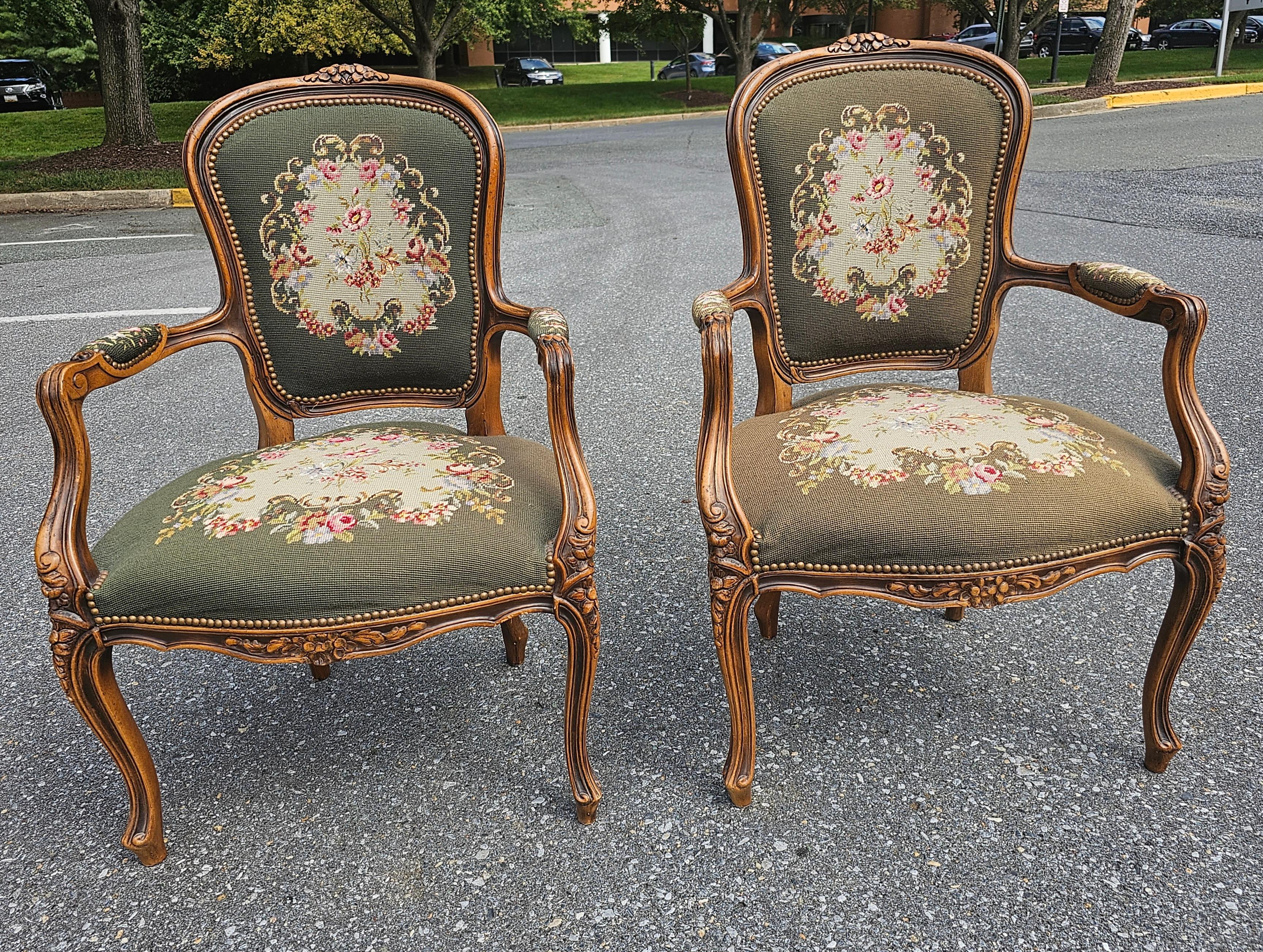 Upholstery Pair of French Louis XVI Carved Fruitwood and Needlepoint Upholstered Bergeres For Sale
