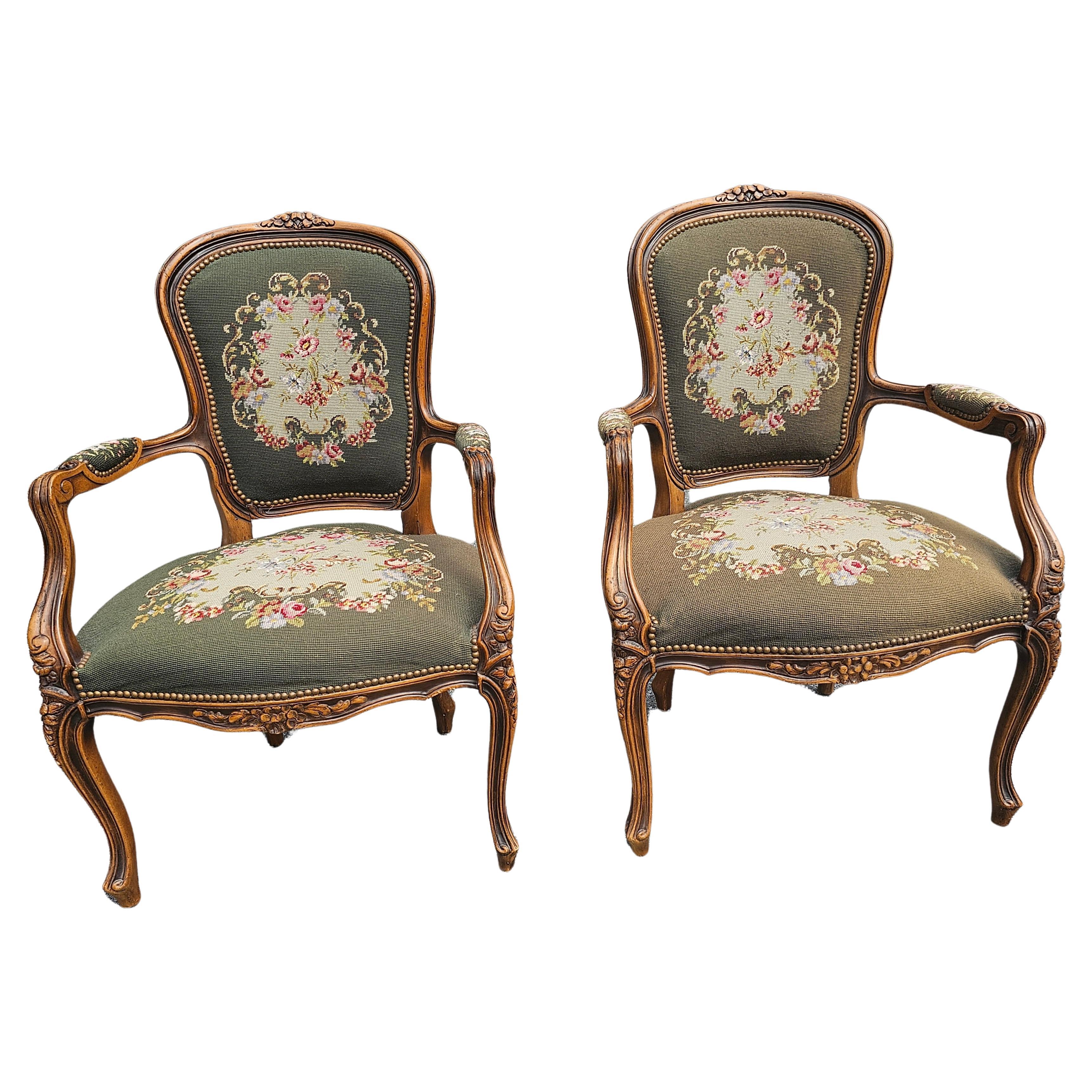 Pair of French Louis XVI Carved Fruitwood and Needlepoint Upholstered Bergeres For Sale