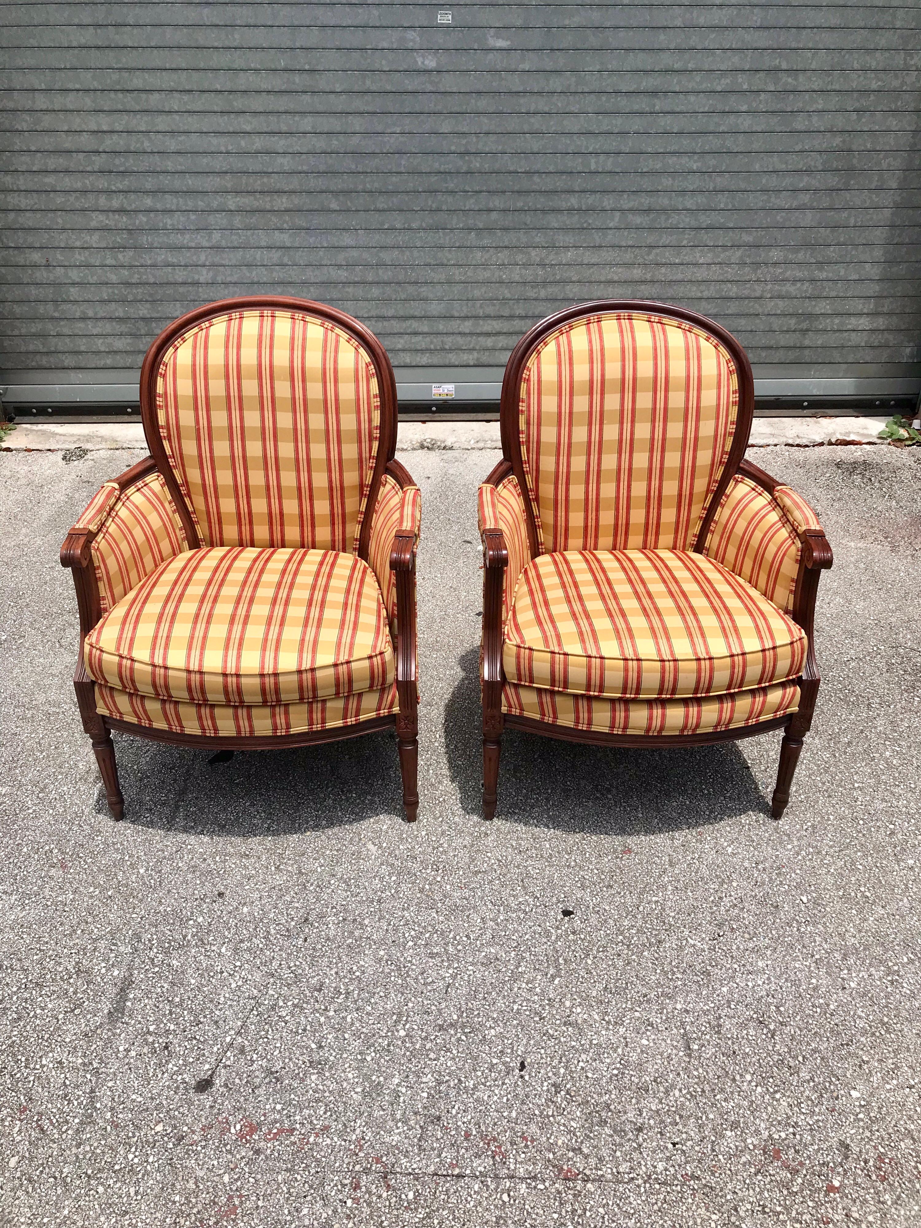 Early 20th Century Pair of French Louis XVI Carved Mahogany Accent Chairs or Bergère Chairs, 1920s