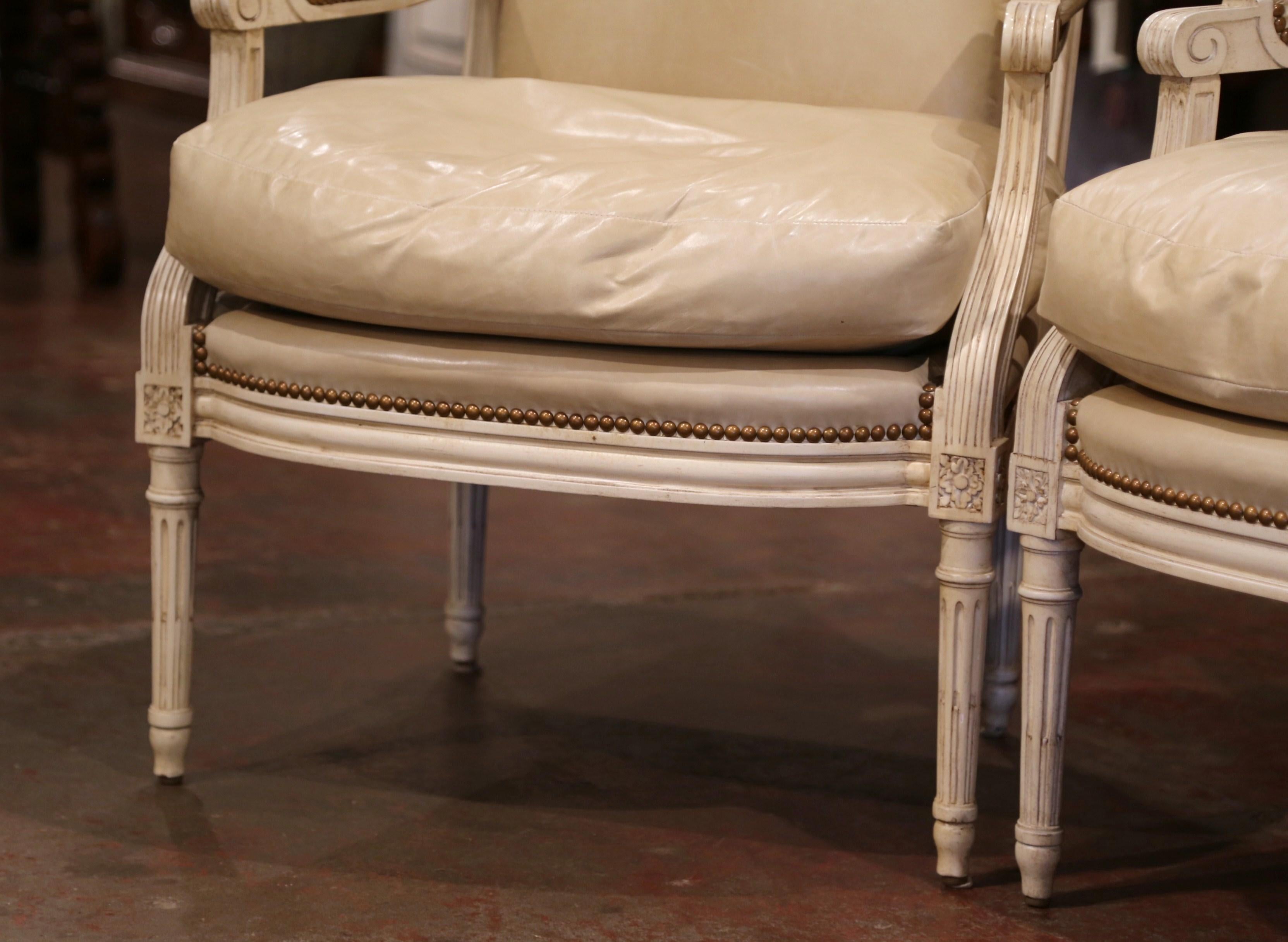 Pair of French Louis XVI Carved Painted Armchairs with Beige Leather Upholstery 1