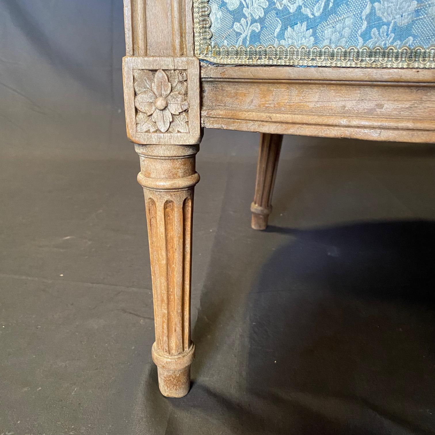 Pair of French Louis XVI Cerused Bergères Chairs with Blue & White Upholstery 1