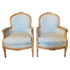 Pair of French Louis XVI Cerused Bergères Chairs with Blue & White Upholstery