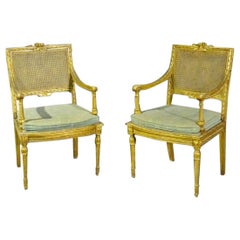 Pair of French Louis XVI Gilded Caned Armchairs Armchairs Fauteuils, circa 1920s