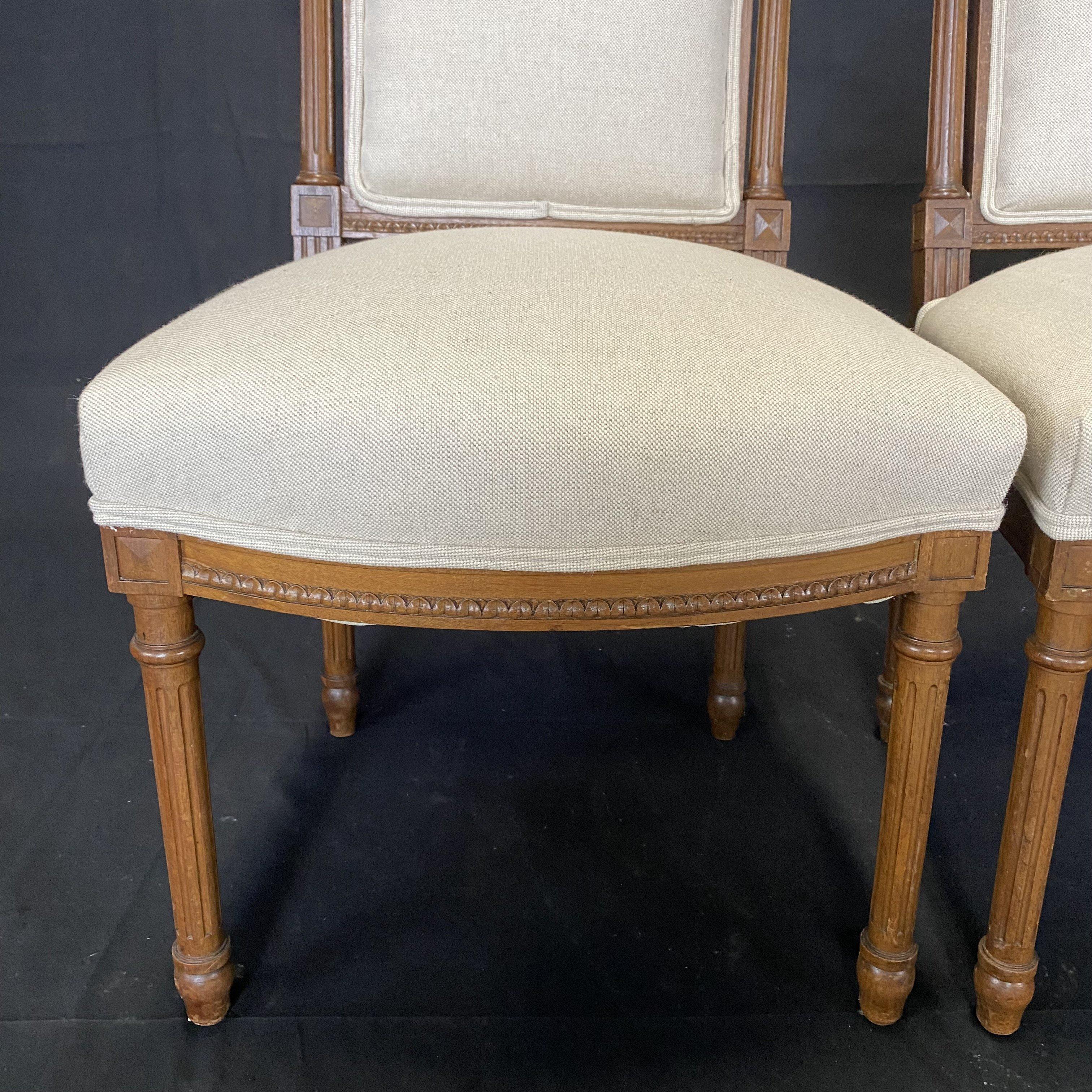 Pair of French Louis XVI Intricately Carved Walnut Side Chairs, New Upholstery In Good Condition In Hopewell, NJ