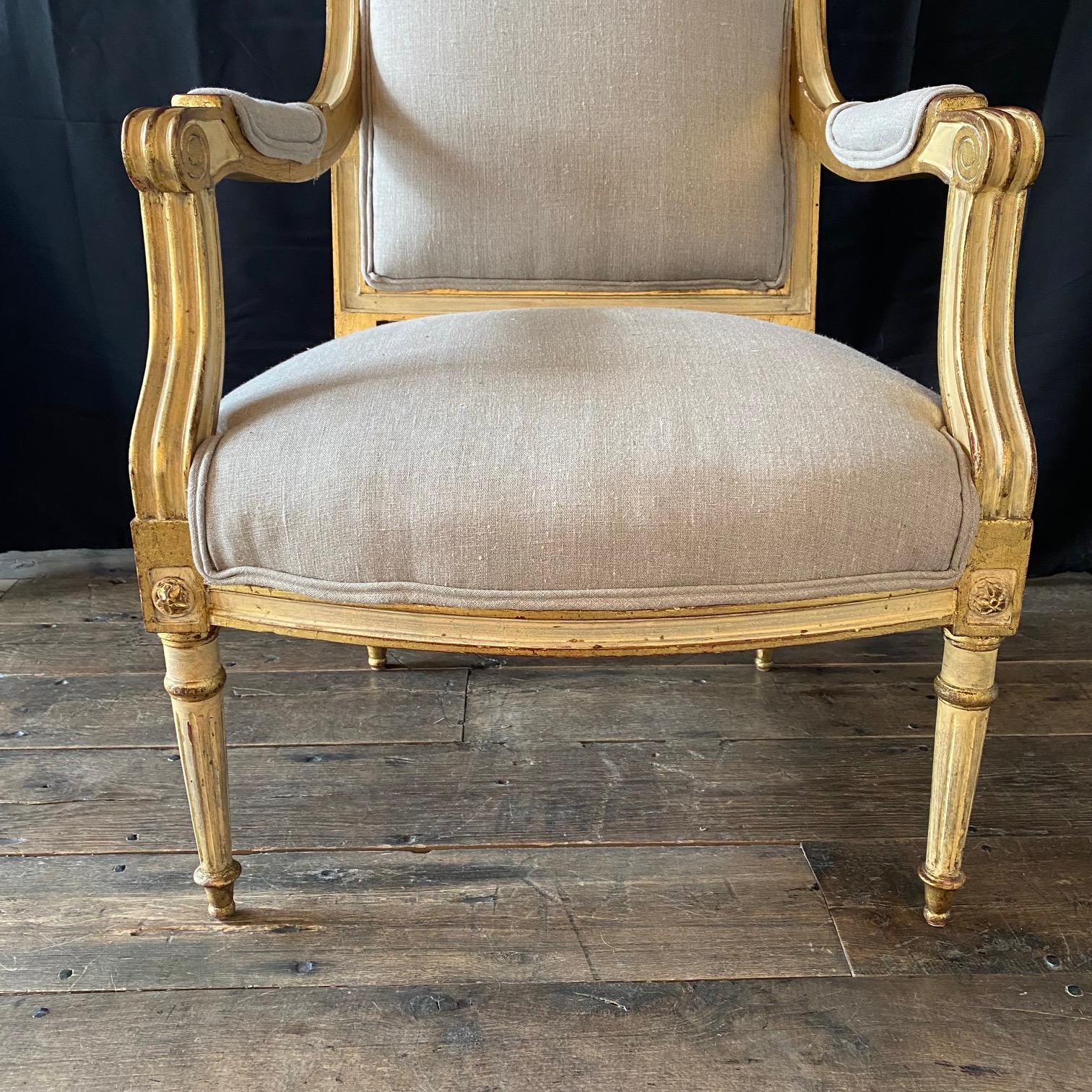 Early 20th Century Pair of French Louis XVI Neoclassical Gold Gilt Painted Armchairs For Sale
