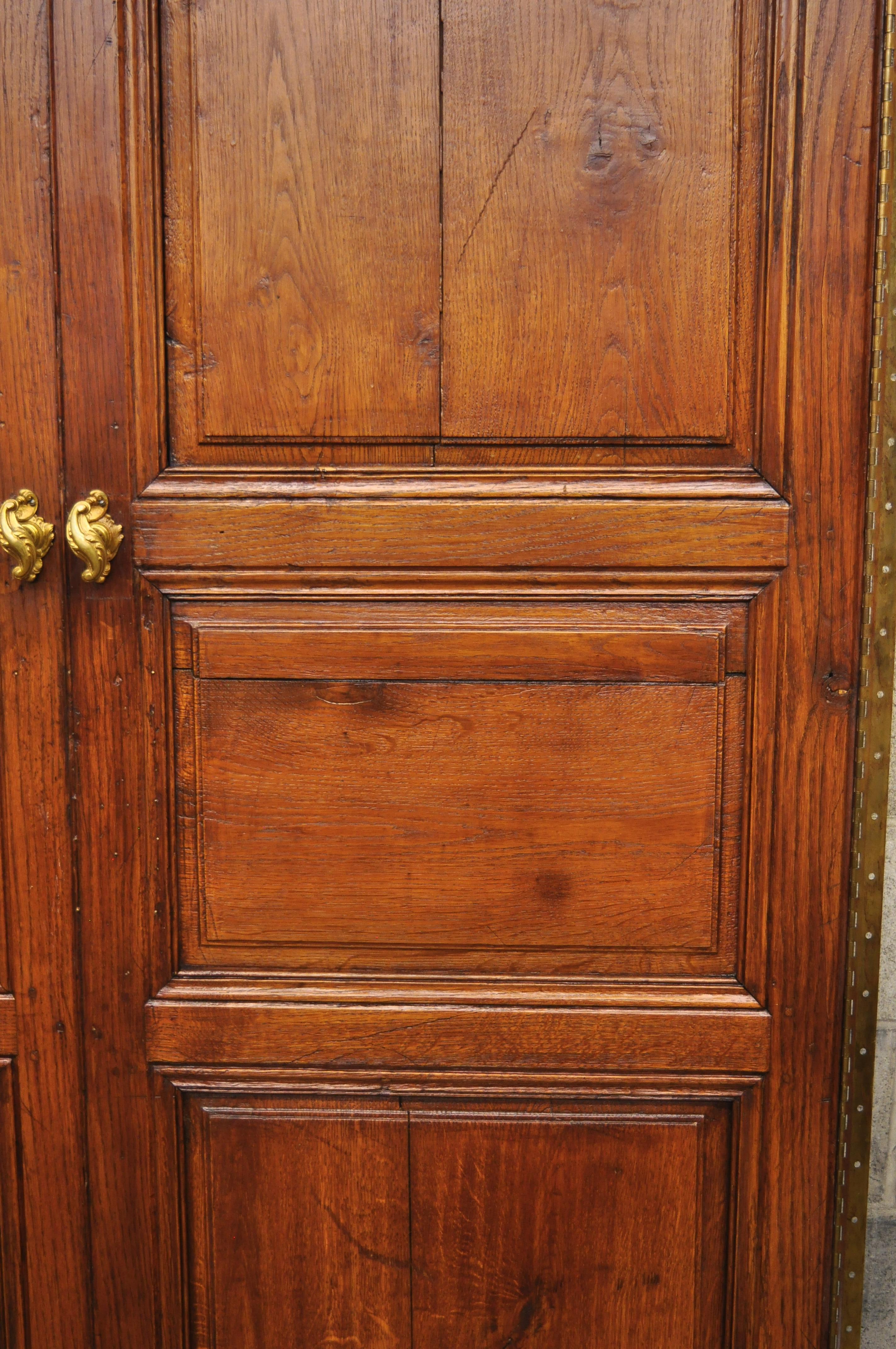 Pair of French Louis XVI Oak Interior Double Doors with Bronze Rococo Door Knobs 3