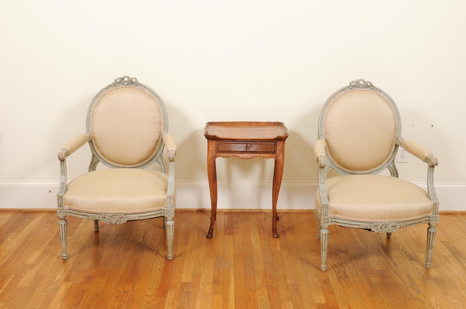 Pair of French Louis XVI Style 1850s Oval Back Armchairs with Carved Ribbons In Good Condition In Atlanta, GA