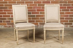 Pair of French Louis XVI Style 1920s Painted Side Chairs with Fluted Legs