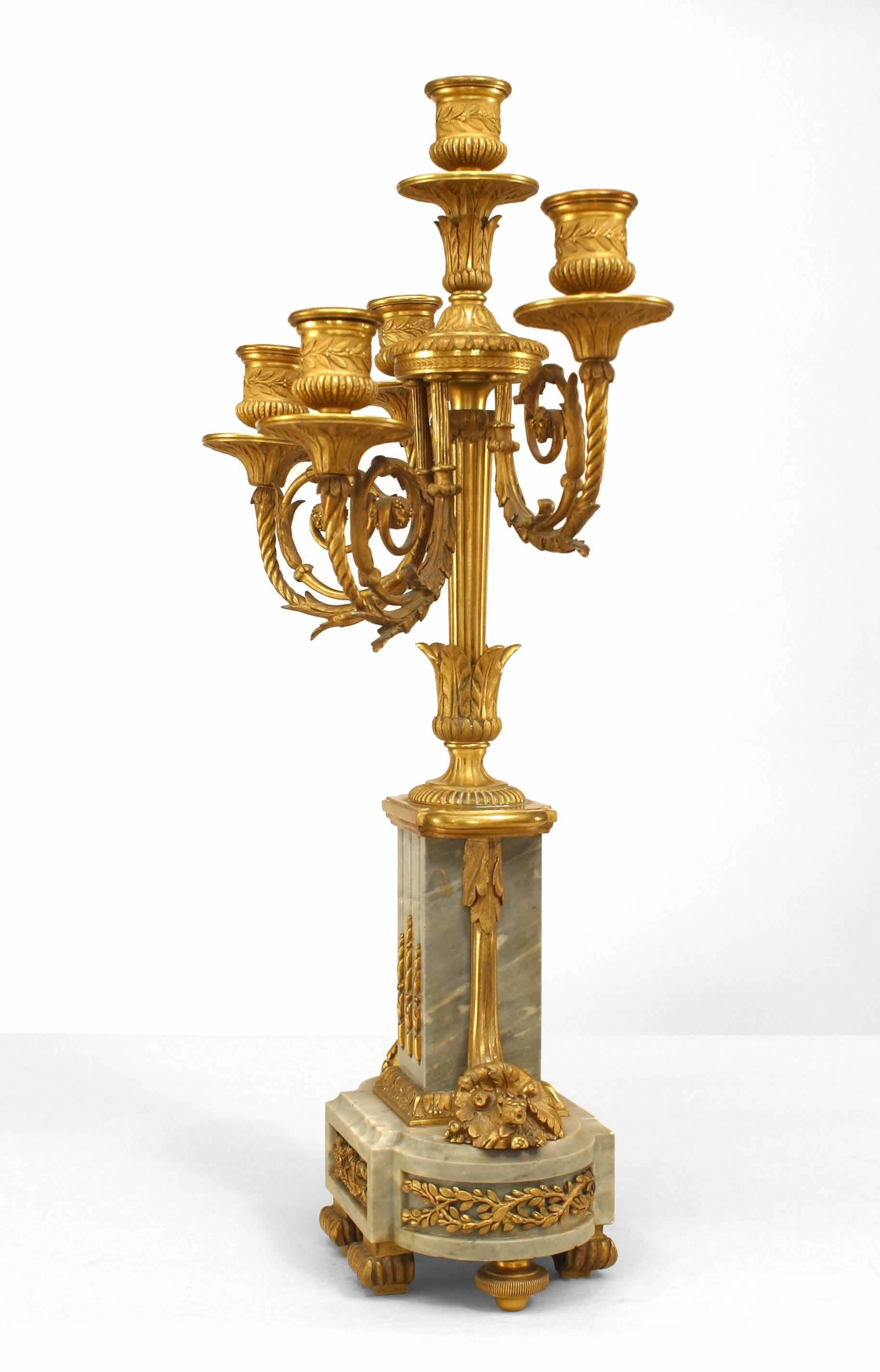 Pair of French Louis XVI-style (19th Century) gilt bronze and grey marble base 5 scroll arm candelabra with cornucopia on side of base and foliate mounts. (PRICED AS Pair)
