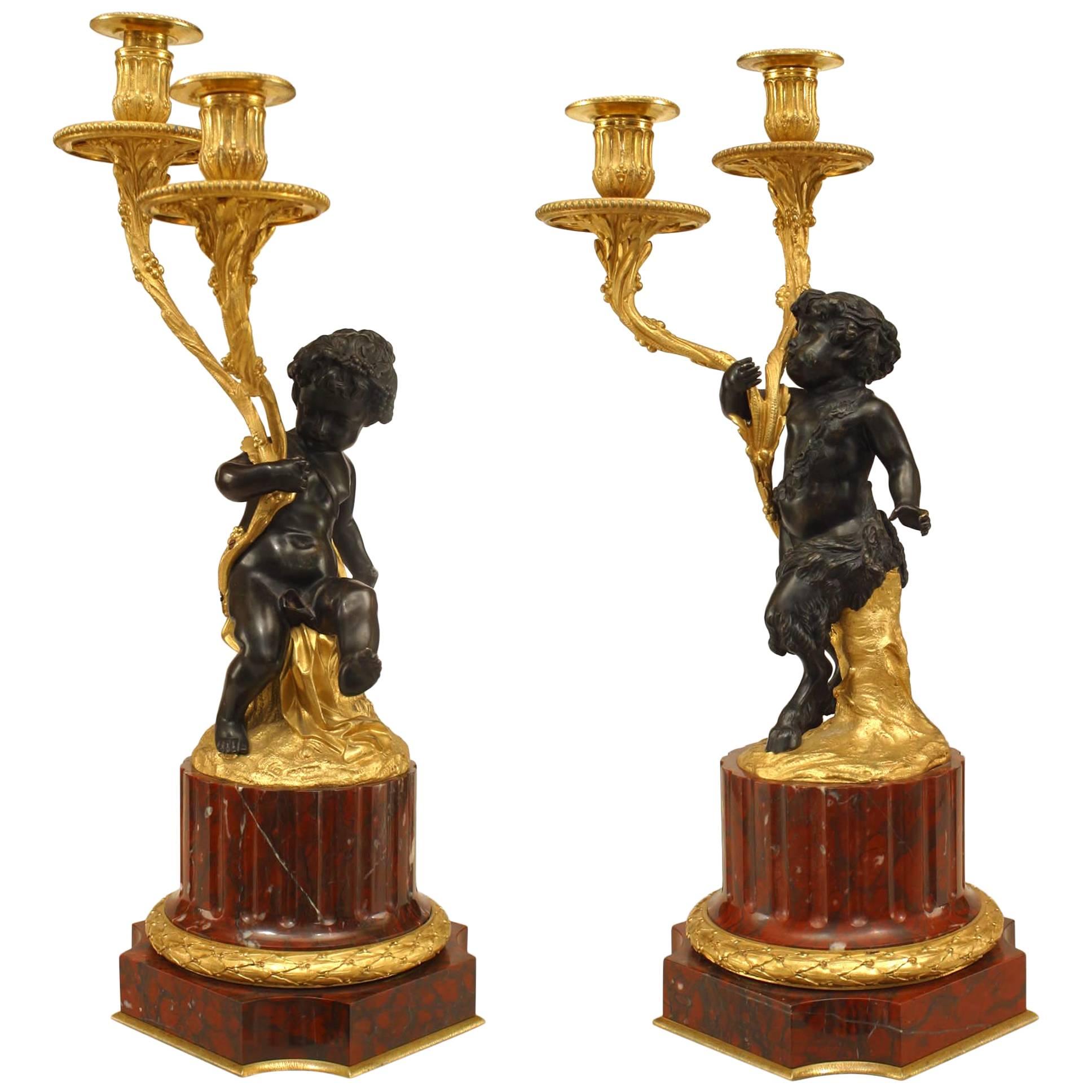 Coppia di candelabri francesi in stile Luigi XVI con Cupido e Satiro in vendita