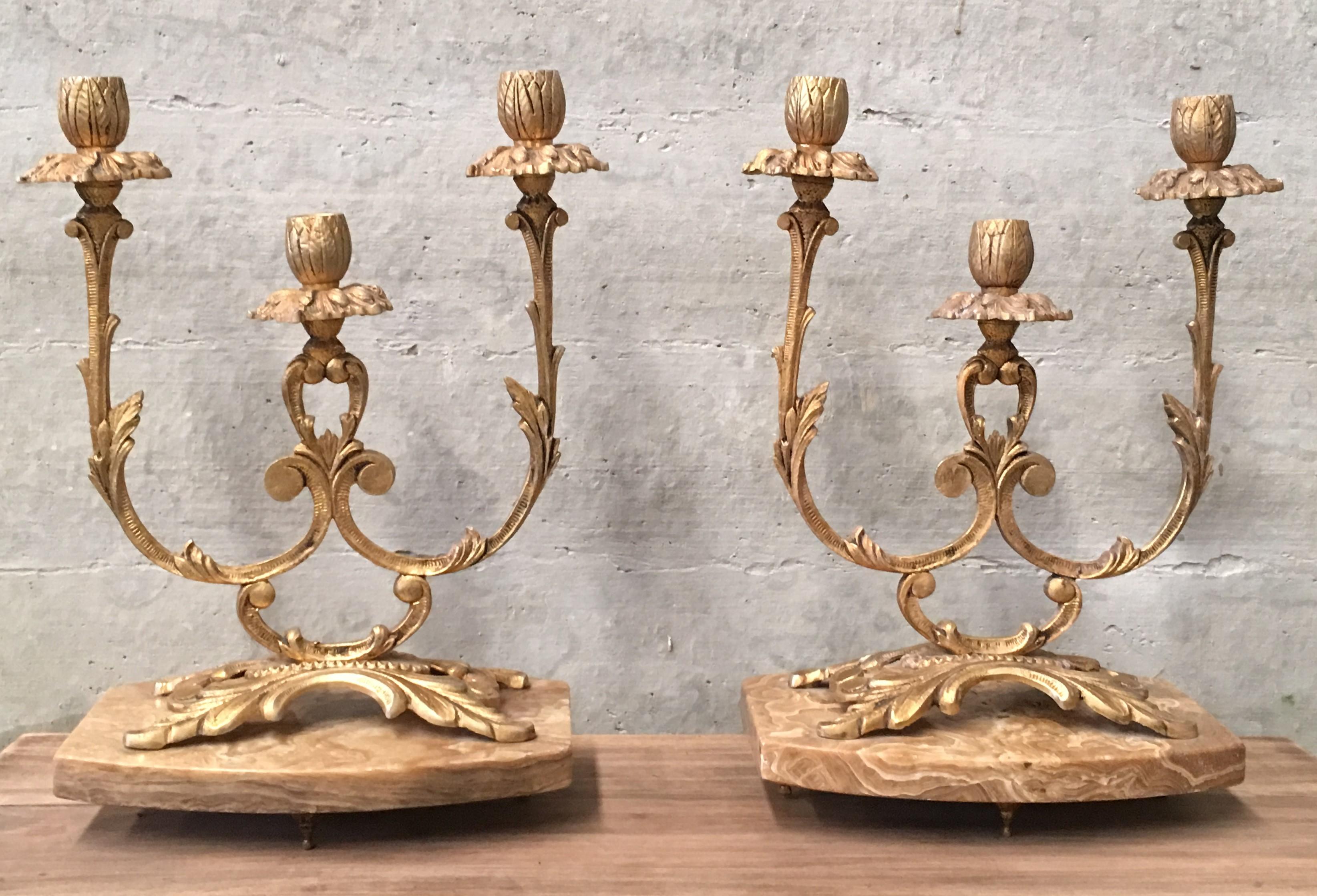 Pair of French Louis XVI Style '19th Century' three scroll arm candelabras.