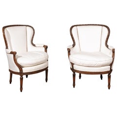 Antique Pair of French Louis XVI Style 19th Century Upholstered Wingback Bergère Chairs