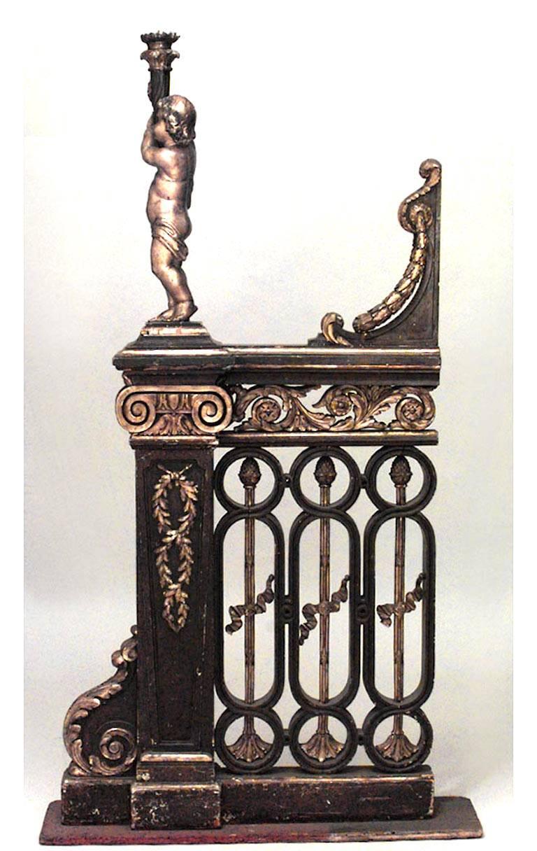 Pair of French Louis XVI style (19th Century) walnut and gilt trimmed filigree railing with gilt cupid holding torch and wreath back (PRICED AS Pair).
