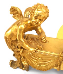 Pair of Louis XVI Bronze Cupid Andirons