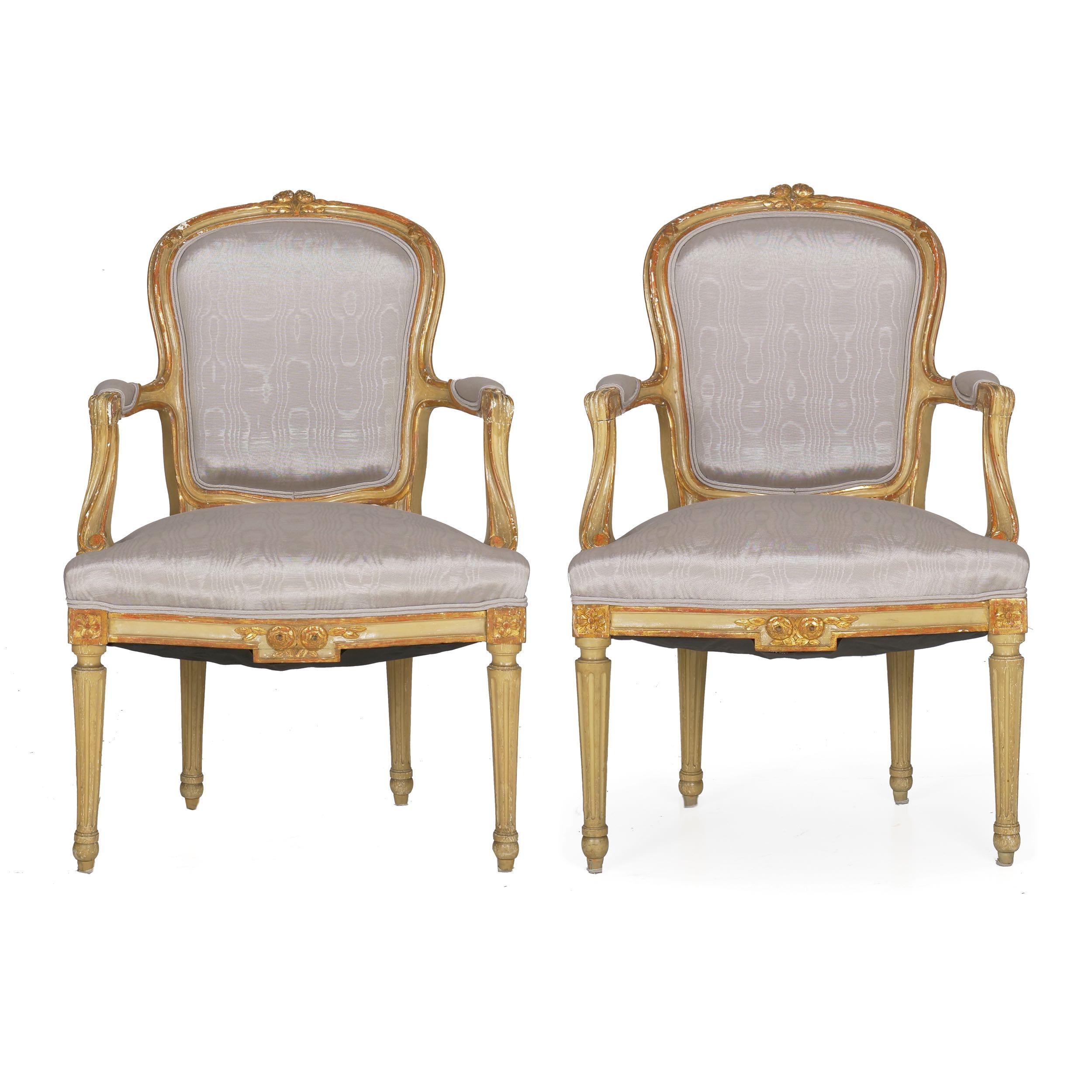 Pair of French neoclassical painted fauteuils,
circa late 19th century
Item # 007DPG30

This fantastic 19th century pair of armchairs is carved in the taste of the Louis XVI period with the typical fluted legs, cabriolet arm supports, and simple
