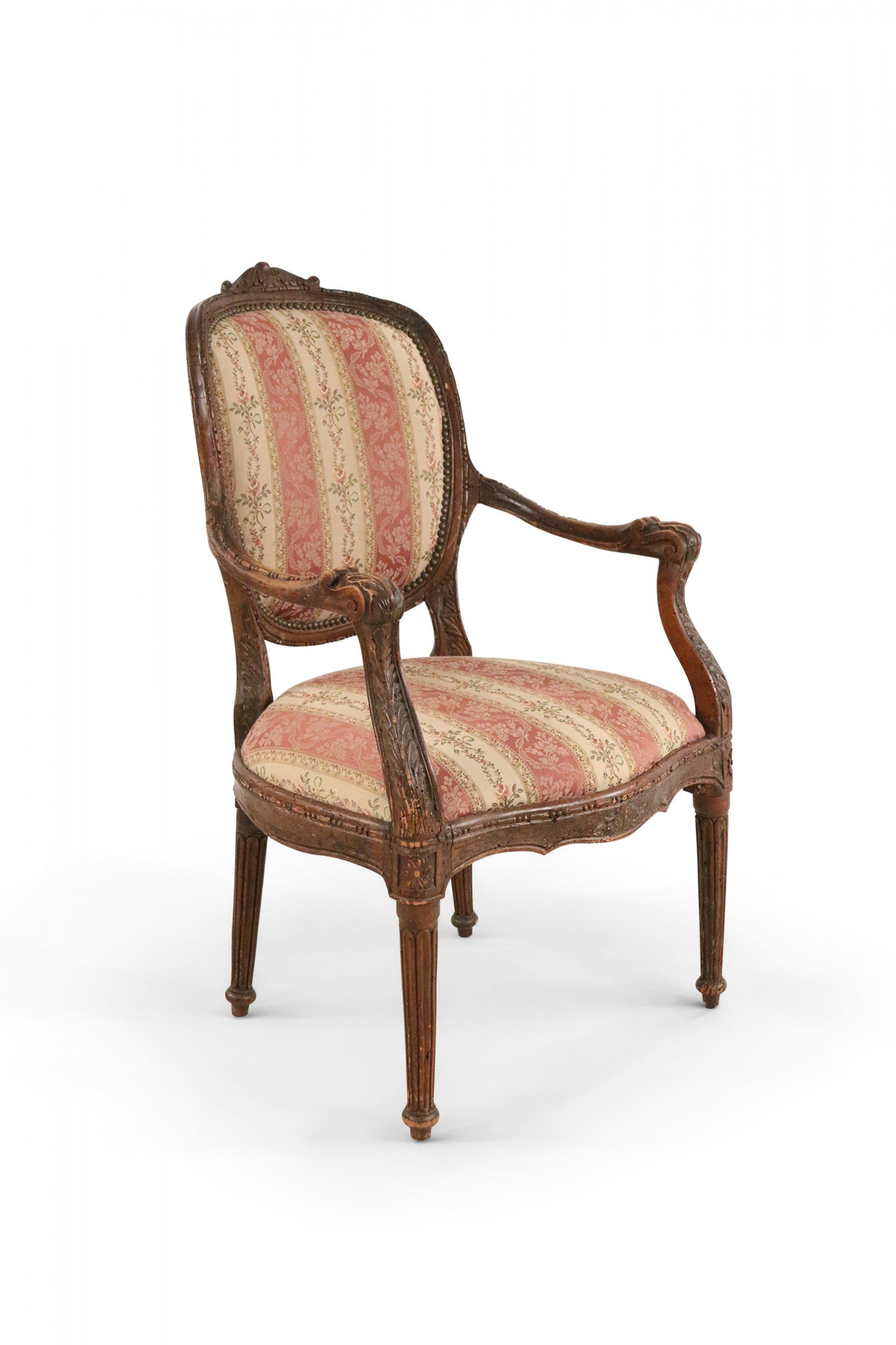 Carved Pair of French Louis XVI Style Beige and Pink Stripe Upholstered Armchairs For Sale