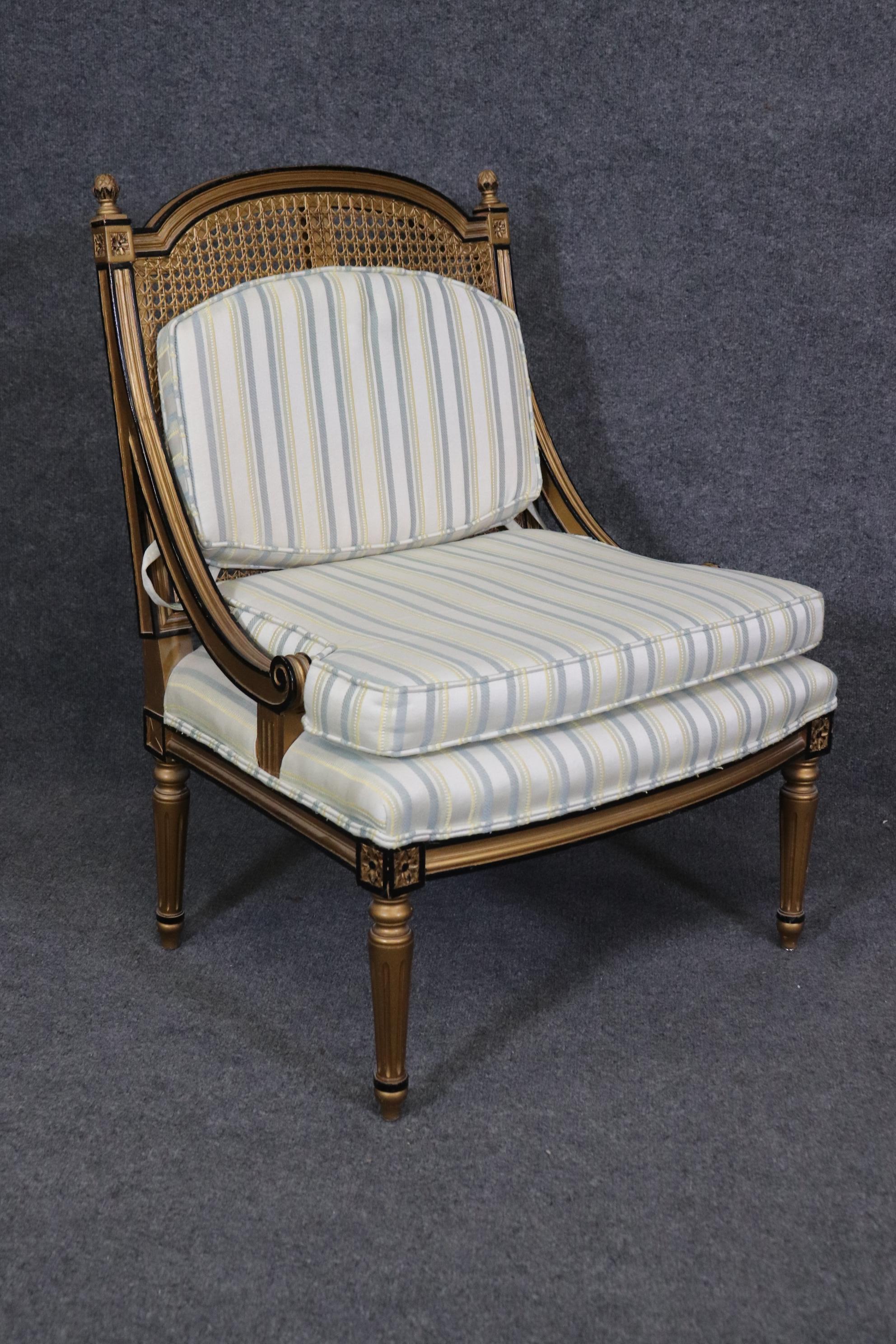 Upholstery Pair of French Louis XVI Style Black and Gold Cane Back Bergeres, Lounge Chairs For Sale