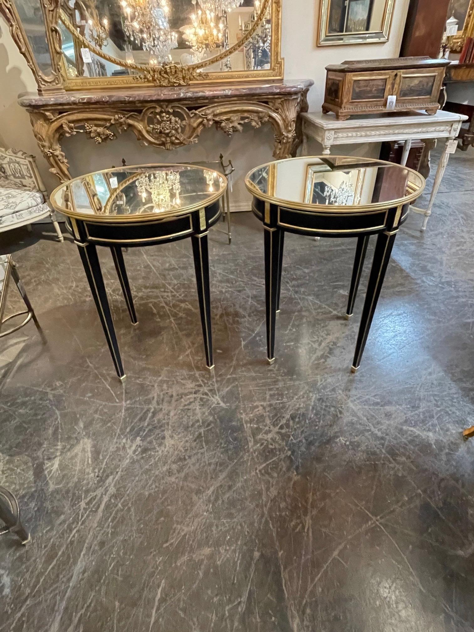 Very fine of French Louis XVI style black lacquered and brass side table with mirrored top. Creates an upscale classic look! Note: 1 left.