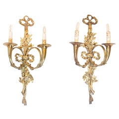 Antique Pair of French Louis XVI Style Bronze Two-Light Sconces with Hunting Horns