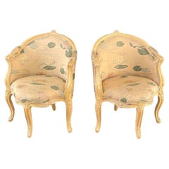 Retro Pair of French Louis XVI Style Carved Chairs with an Antiqued Paint Finish