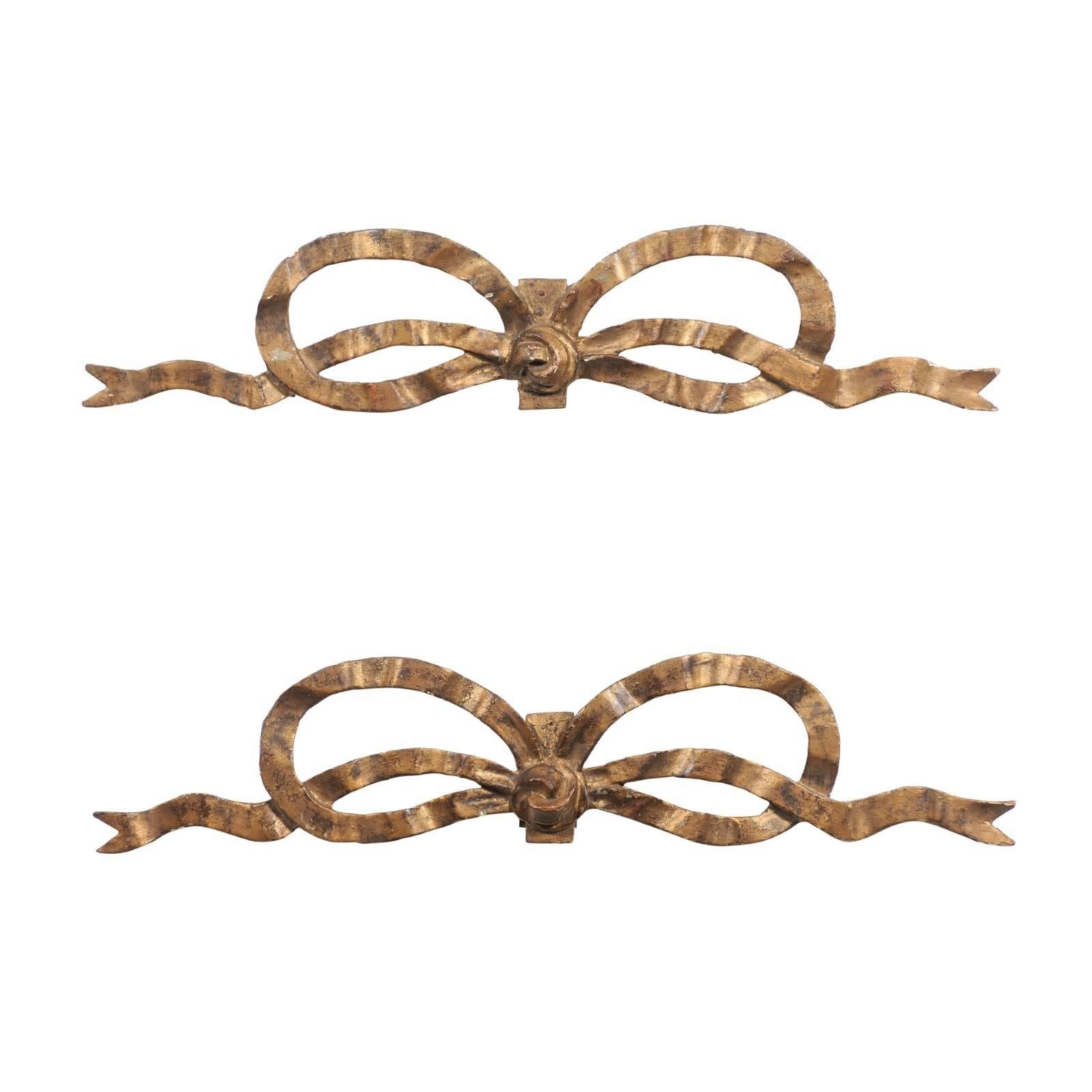 Pair of French Louis XVI Style Carved Giltwood Ribbon Decorations, circa 1900