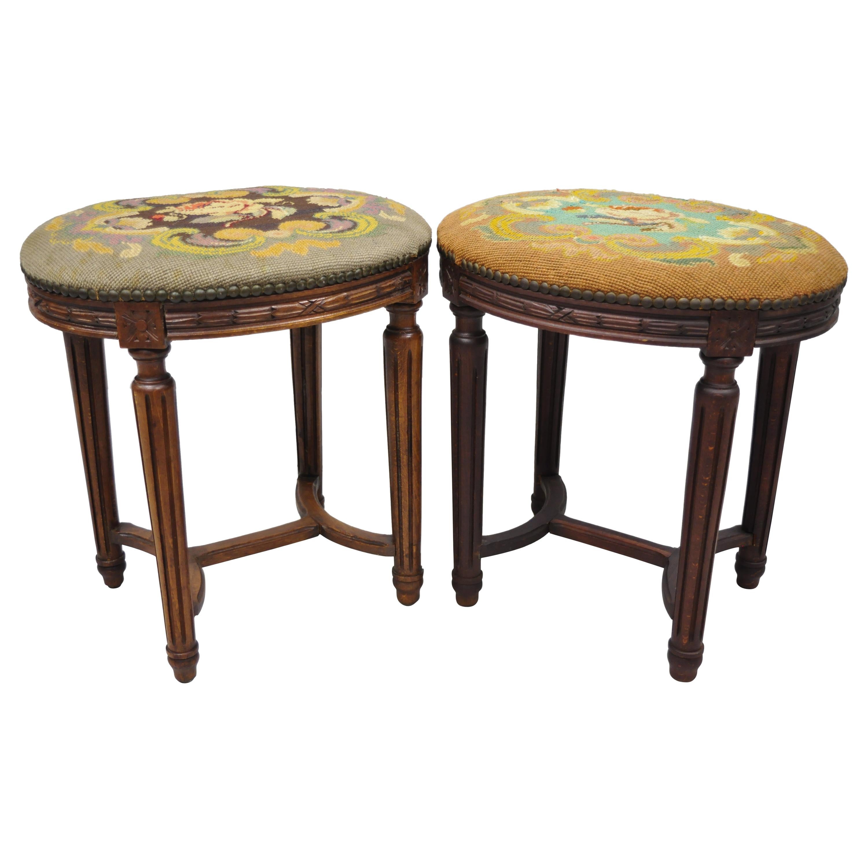 Pair of French Louis XVI Style Carved Walnut and Needlepoint Oval Stools For Sale