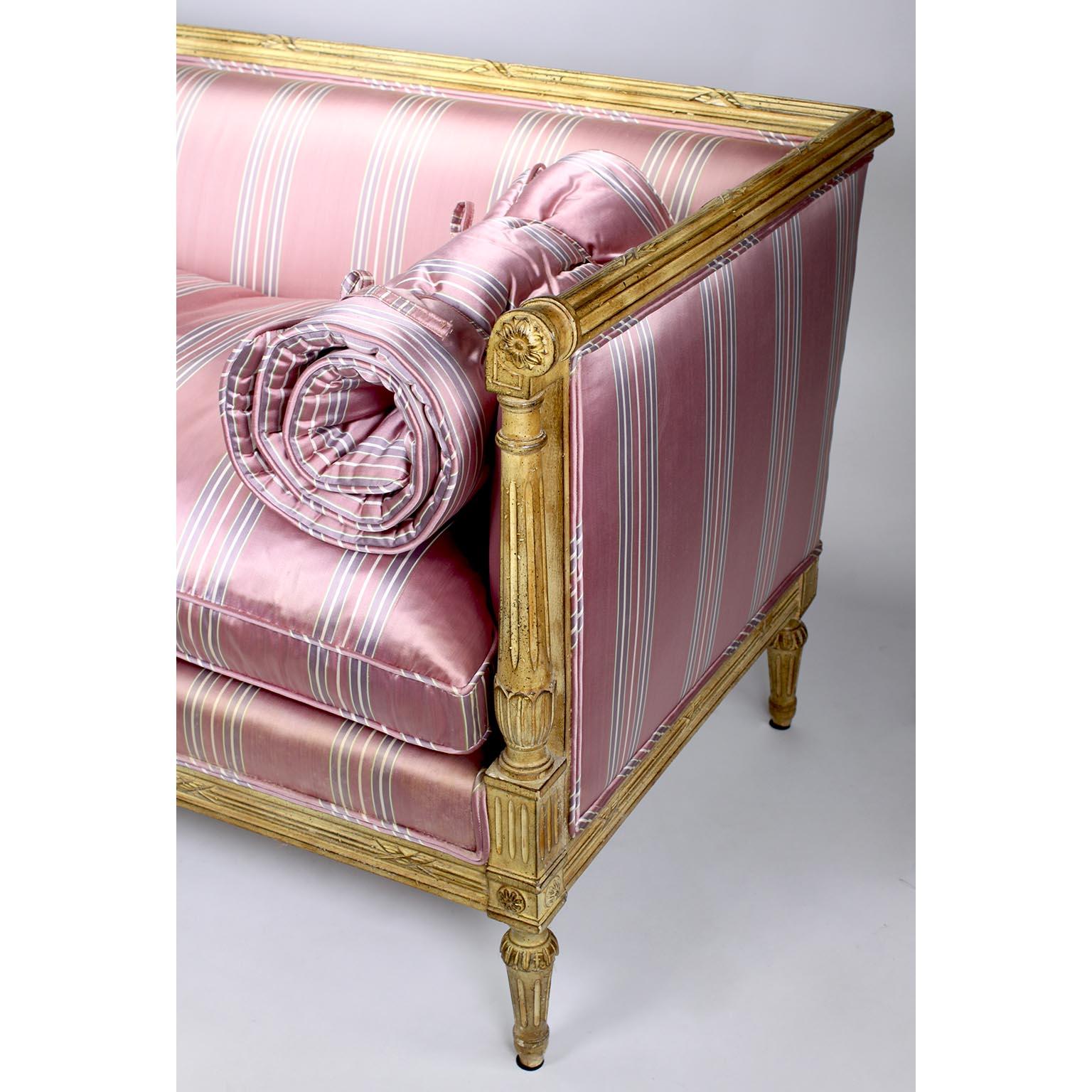 Fabric Pair of French Louis XVI Style Carved-Wood Cream-Lacquered Settees, Jansen Attr. For Sale