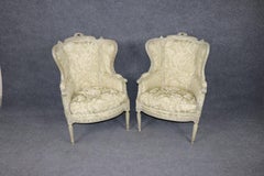 Pair of French Louis XVI Style Distressed Painted Wingback Bergere Chairs