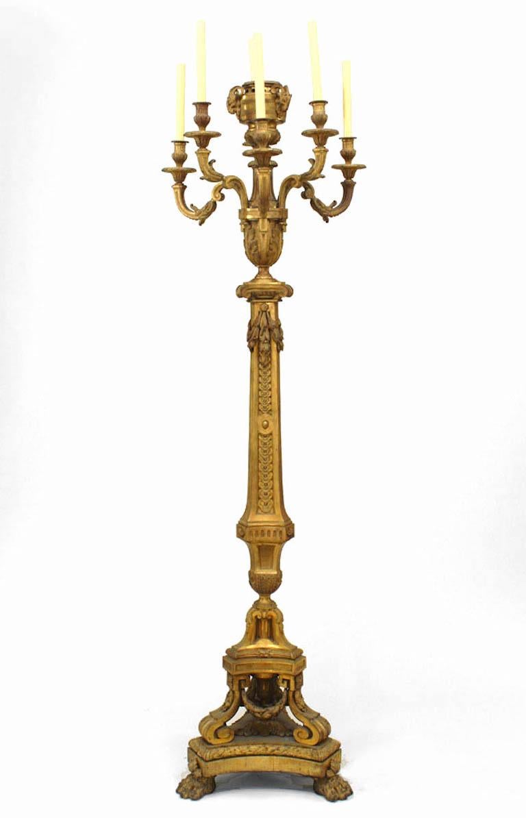 Pair of French Louis XVI-style (19th Century) bronze festoon design floor torchiere with 6 arms and claw foot base (PRICED AS Pair).
