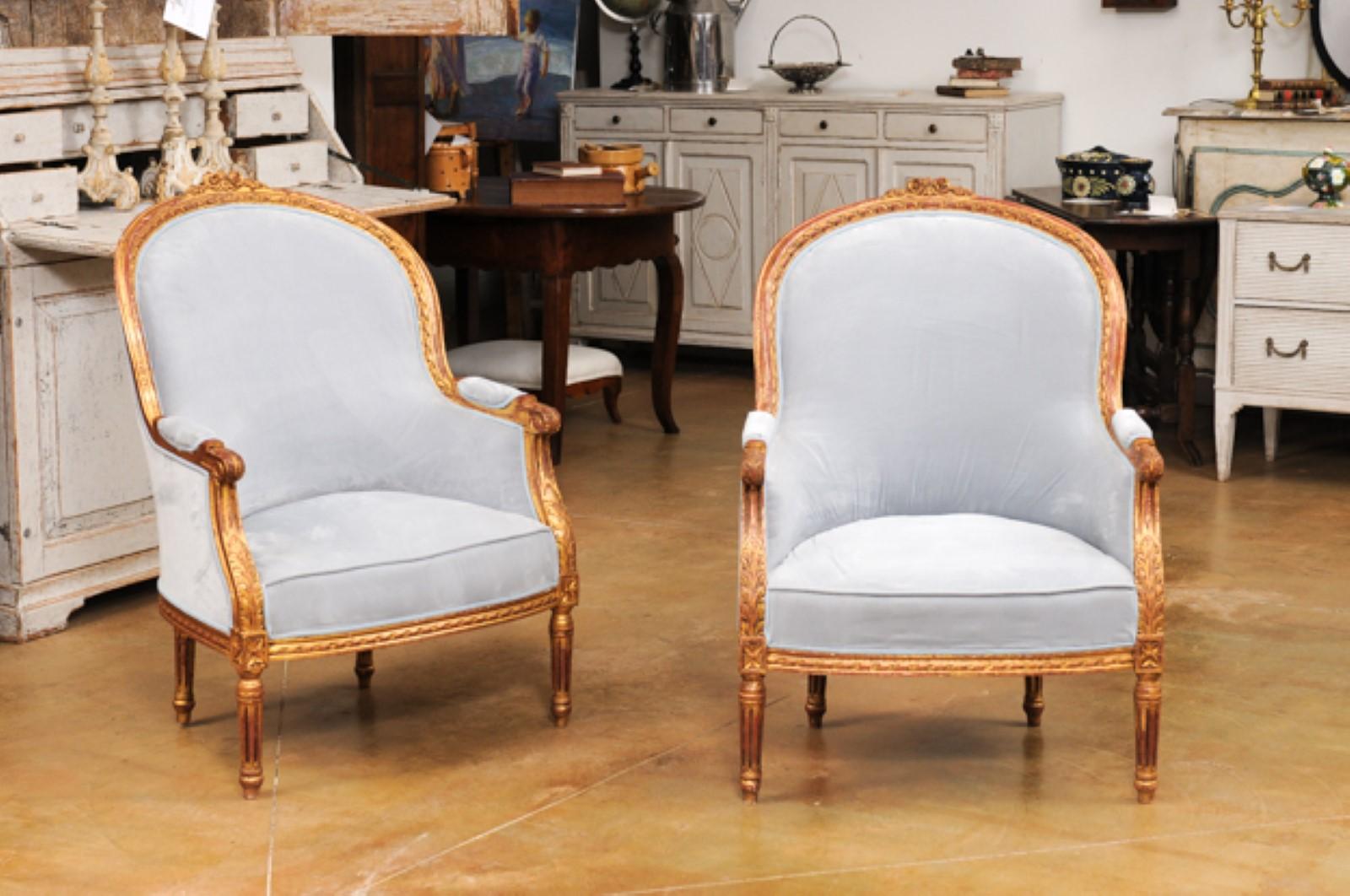 Carved Pair of French Louis XVI Style Gilded Bergère Chairs with Pierre Frey Upholstery