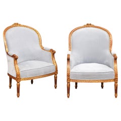 Pair of French Louis XVI Style Gilded Bergère Chairs with Pierre Frey Upholstery