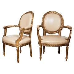 Pair of French Louis XVI Style Gilded Fauteuils
