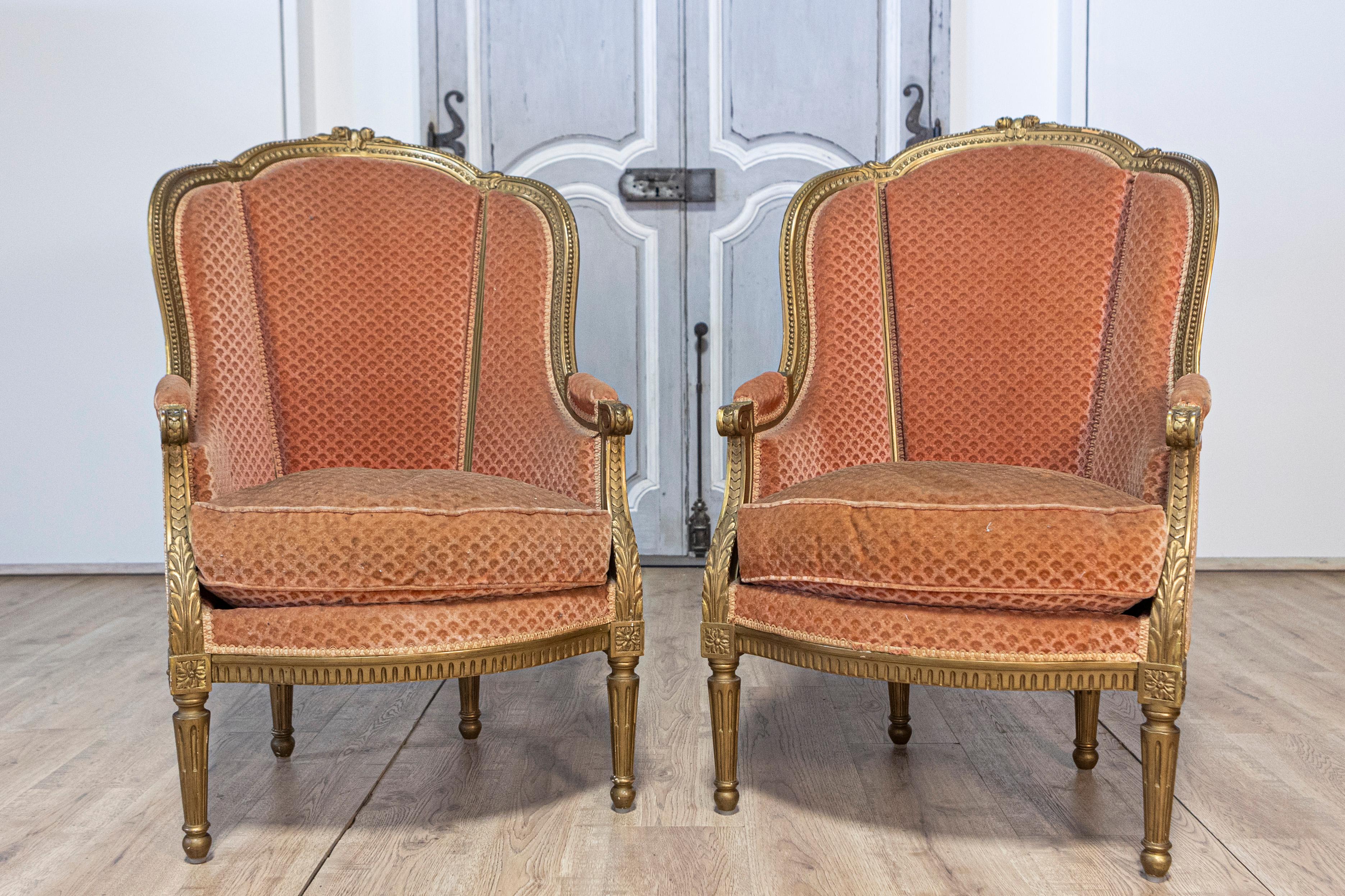 Pair of French Louis XVI Style Gilded Wood Bergères Chairs with Carved Décor In Good Condition For Sale In Atlanta, GA