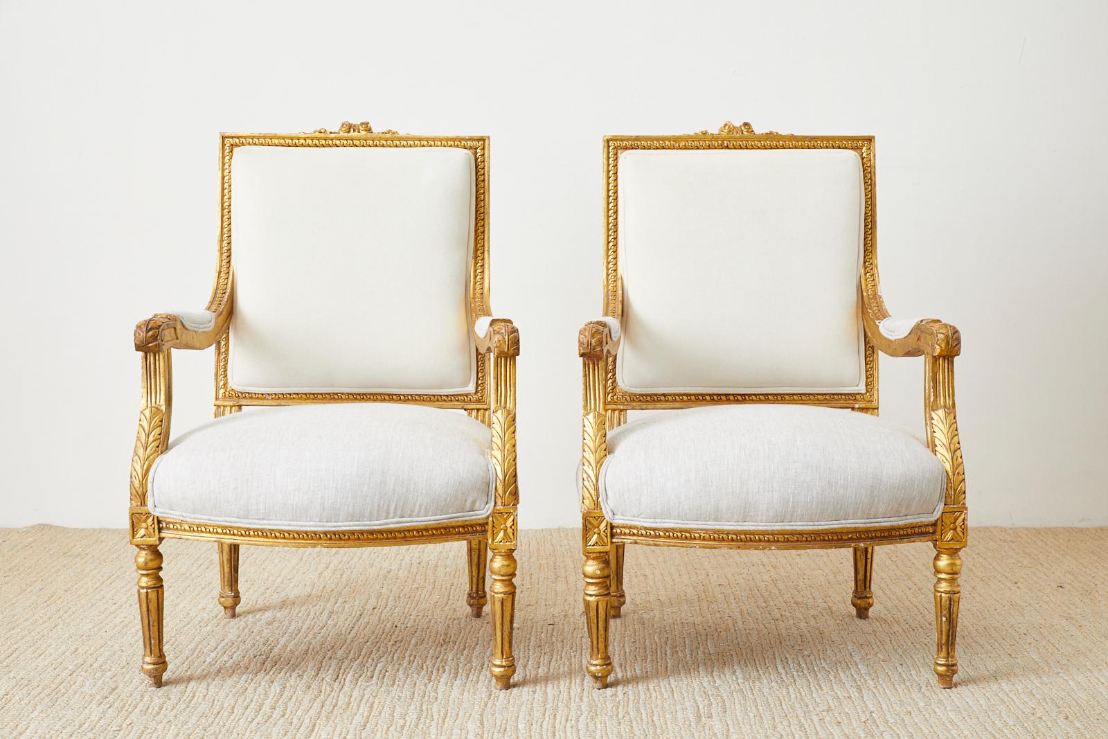 Hand-Crafted Pair of French Louis XVI Style Gilt Fauteuils a La Reine