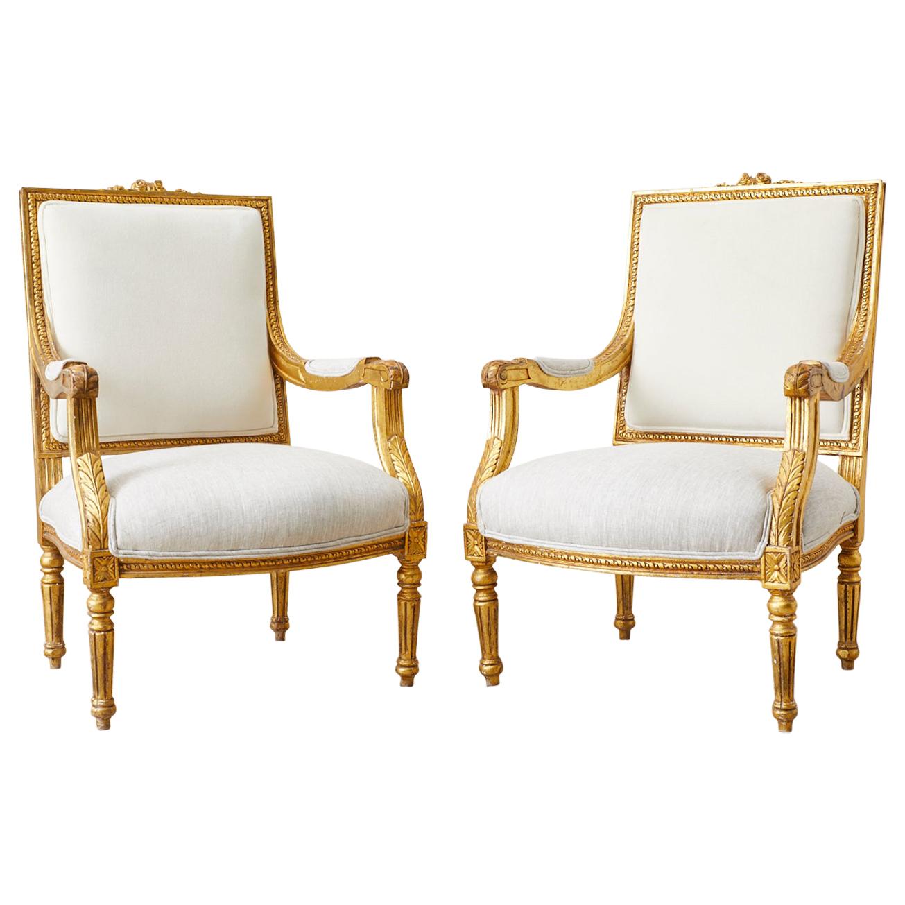 Pair of French Louis XVI Style Gilt Fauteuils a La Reine