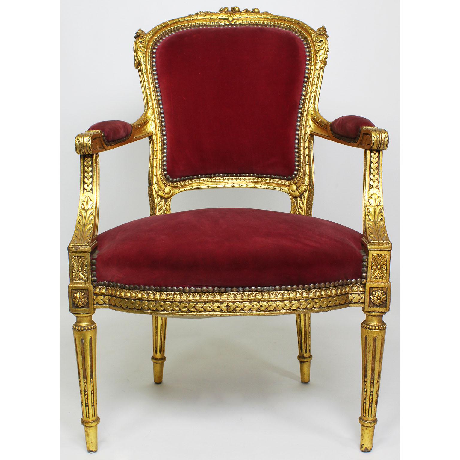 Pair of French Louis XVI Style Giltwood Carved Rococo Fauteuils Armchairs In Fair Condition In Los Angeles, CA