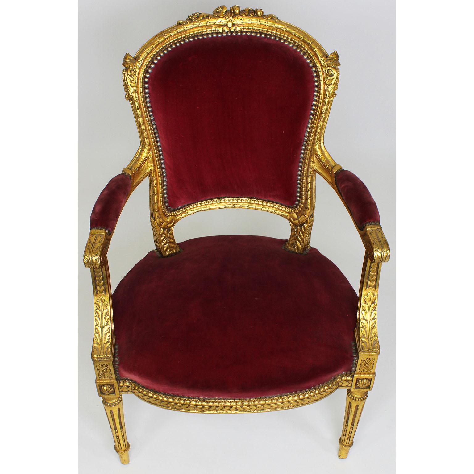 Early 20th Century Pair of French Louis XVI Style Giltwood Carved Rococo Fauteuils Armchairs