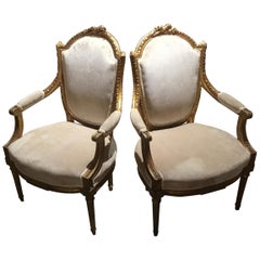 Pair of French Louis XVI Style Giltwood Chairs with New Cream Upholstery