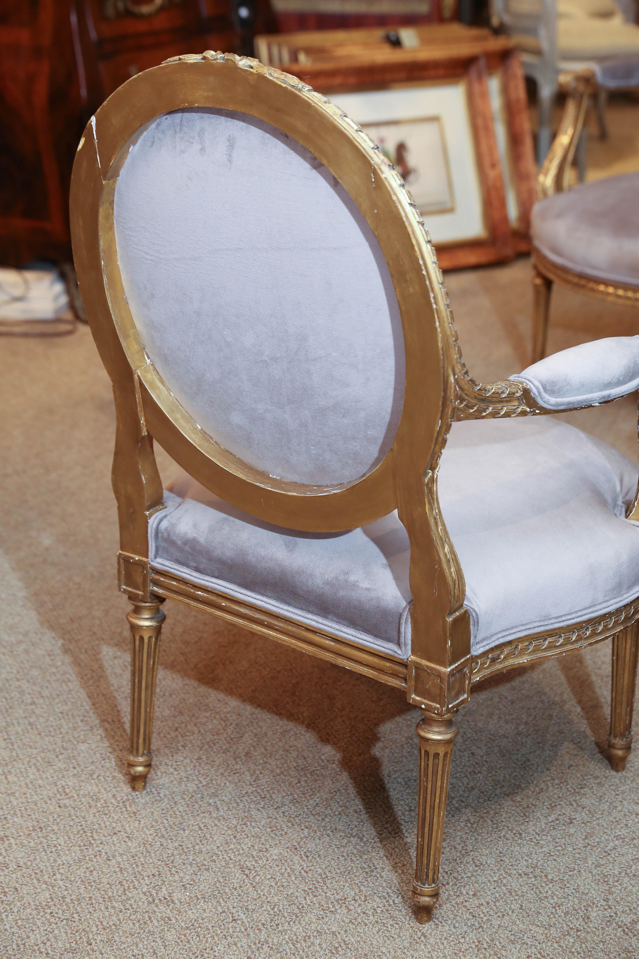 Pair of French Louis XVI Style Giltwood Fauteuils, Early 19th Century 1