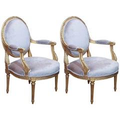 Pair of French Louis XVI Style Giltwood Fauteuils, Early 19th Century