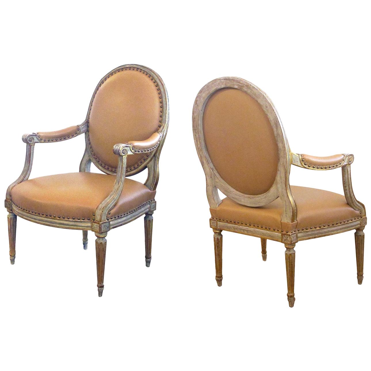 Pair of French Louis XVI Style Grey/Green Painted and Parcel-Gilt Armchairs