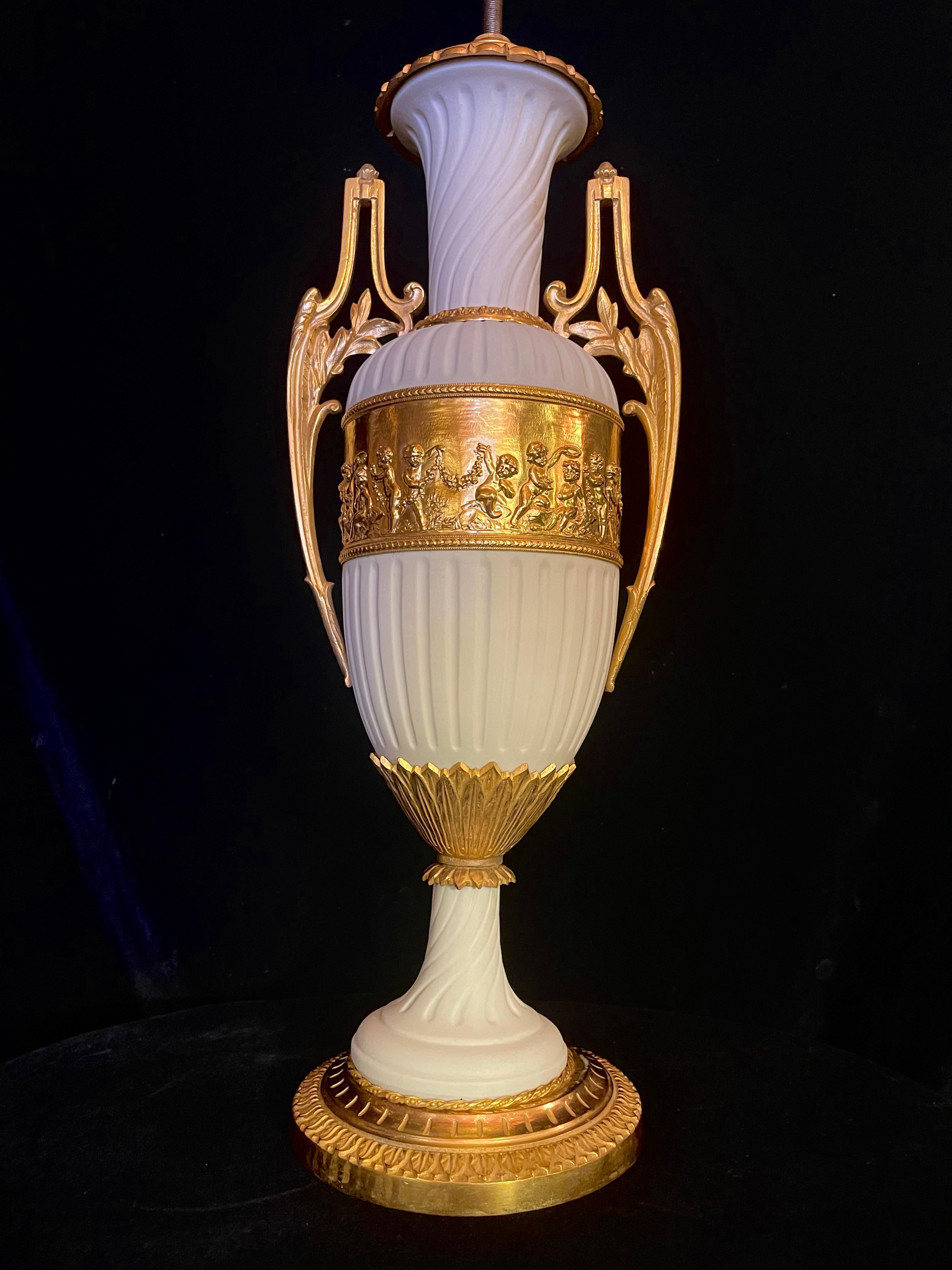 20th Century Pair of French Louis XVI Style Ormolu Mounted Biscuit Porcelain Lamps For Sale