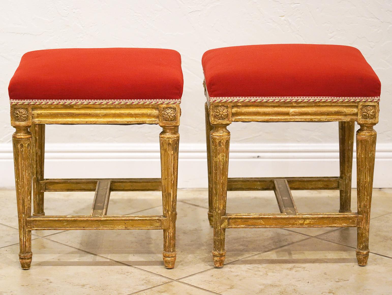 Carved Pair of French Louis XVI Style Paint and Gilt Upholstered Benches or Stools
