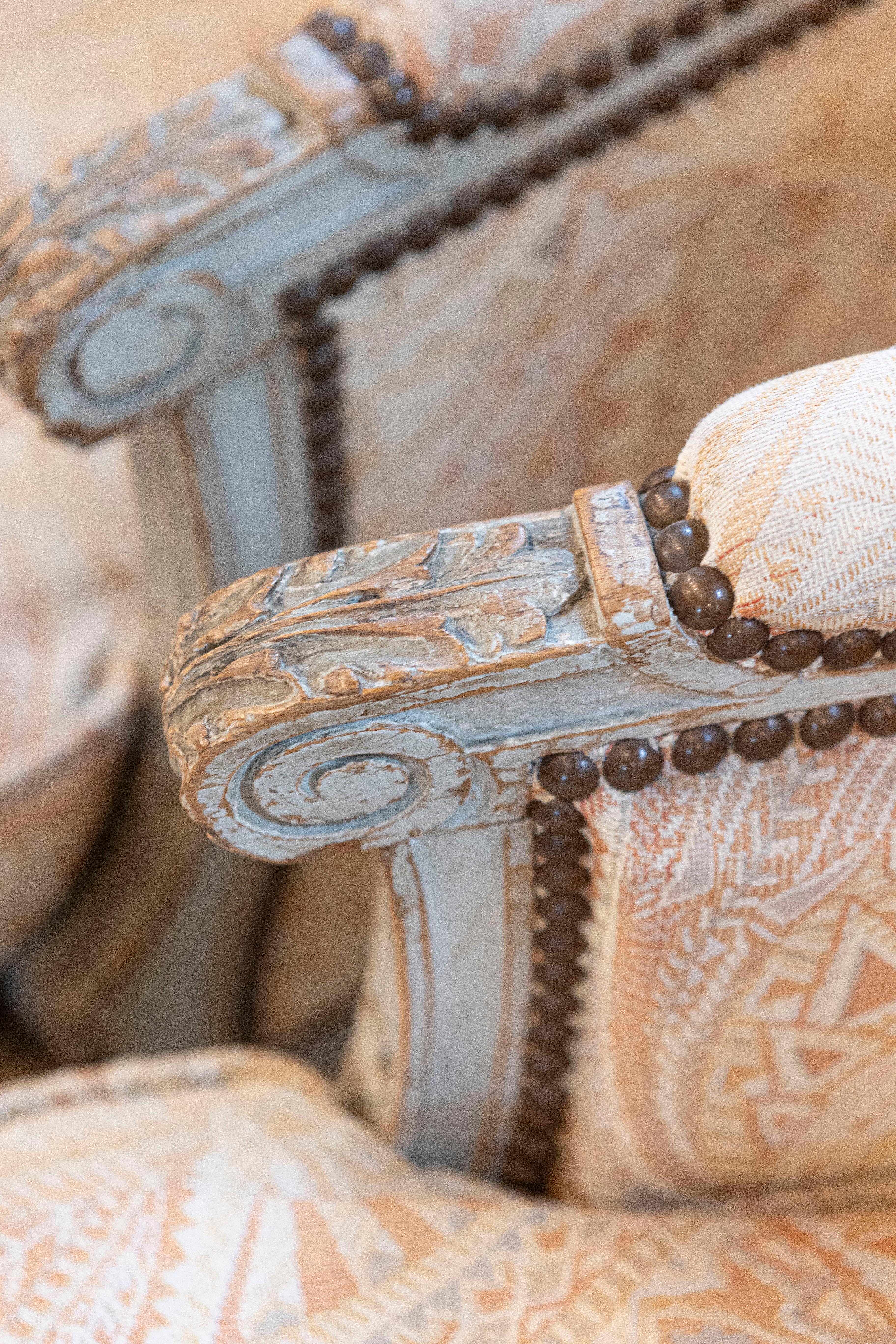 Pair of French Louis XVI Style Painted and Carved Wooden Bergères à Oreilles For Sale 2
