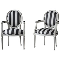 Pair of French Louis XVI Painted Arm Chairs