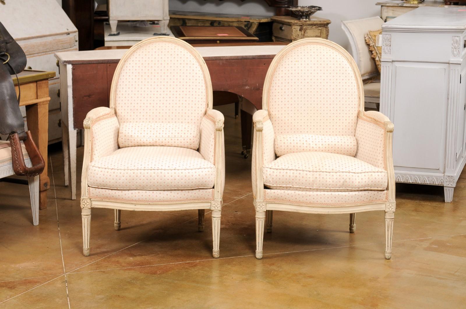 Pair of French Louis XVI Style Painted Bergères Chairs with Oval Shaped Backs For Sale 4