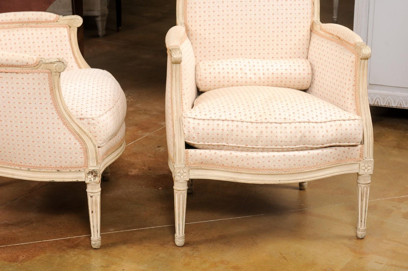 19th Century Pair of French Louis XVI Style Painted Bergères Chairs with Oval Shaped Backs For Sale
